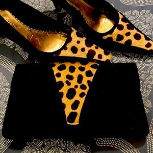 Black suede clutch withAnimal print accent